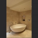 Limestone-bathroom-with-egg-bath